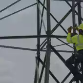 Lineman working on tower